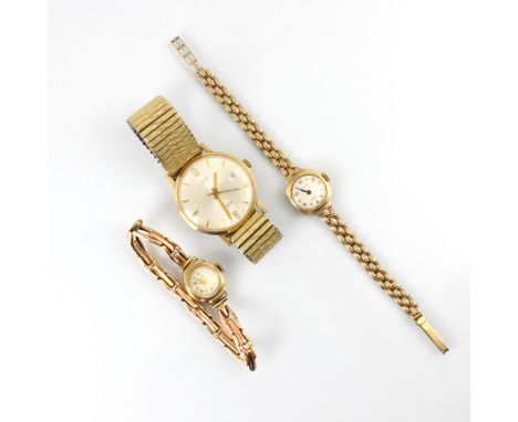 A group of three yellow metal watches, including a 9ct yellow gold ladies ‘Chateau’ watch, the circular cream dial with Arabi