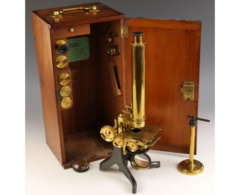 A compound monocular microscope by Newton &amp; Co. of London, mid to late 19th century, the 7½in. lacquered brass main tube 