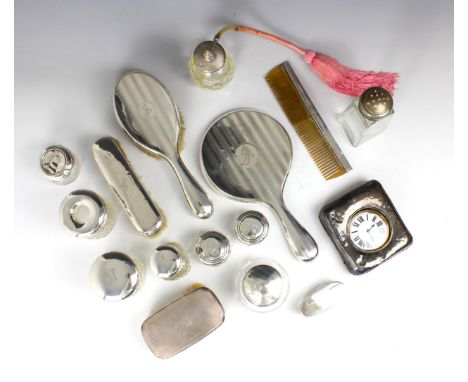 A selection of 20th century silver mounted dressing table items, predominately hallmarked for Chester, including a hand held 