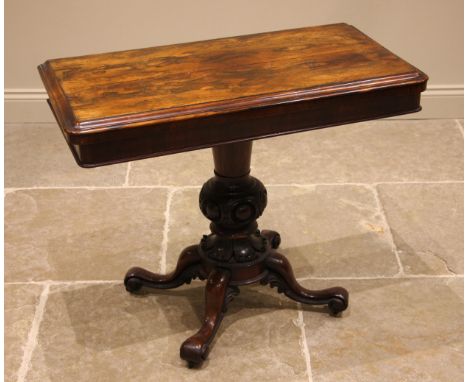 A William IV rosewood card table, the rounded and moulded hinged rectangular top opening to a circular baize lined playing su