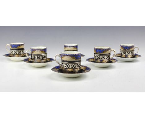 A set of six George V silver mounted coffee cans and saucers, William Davenport, Birmingham possibly 1929, the silver mount w