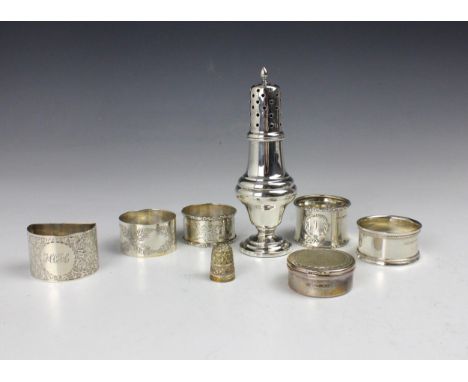 A selection of silver items, including a Victorian silver circular napkin ring, Henry Holland, London 1877, with monogram, 5c