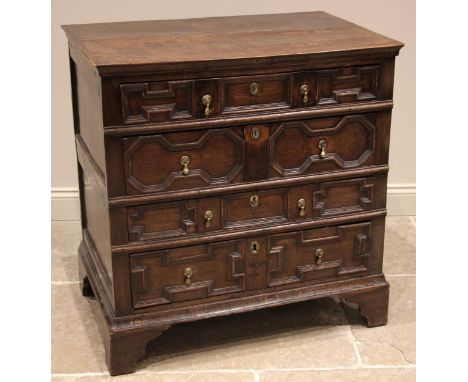 A Jacobean geometric moulded oak chest of drawers, 17th century and later, formed with four long drawers, oak lined running f