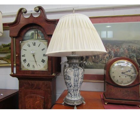 A modern table lamp with pagoda scenes, pleated shade