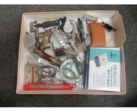 A tray of horological hand tools, horn handled magnifying glass, jewellers scales etc