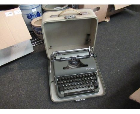 A boxed Olympia typewriter