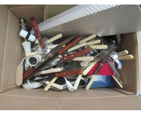 A box of miscellaneous including flatware, linen, trays, lamps, Polaroid camera etc.