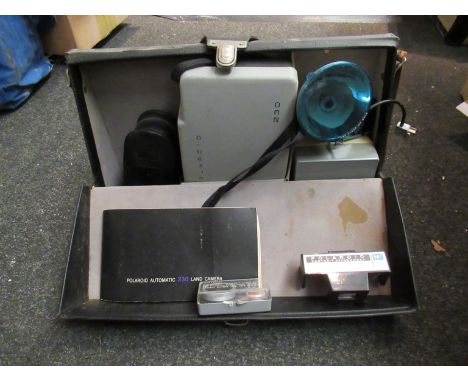 A Polaroid camera in box