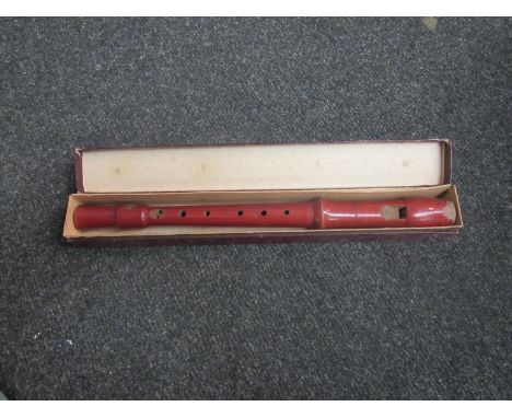 A recorder in cardboard box