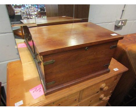 A small lead lined trunk with brass mounts and handles 