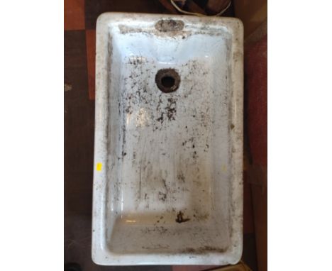 A rectangular white ceramic butler sink/ planter. 
