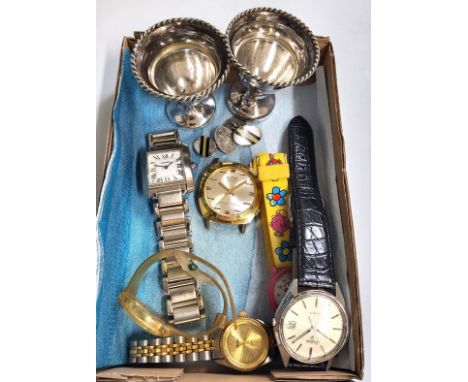 A pair of antique silver and enamel cufflinks, two egg cups, and a collection of six watches. 