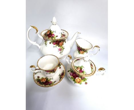 A Royal Doulton 'Old Country Roses' dinner, coffee and tea set, and eight glass pepper pots. (53)(Consists of six coffee cups