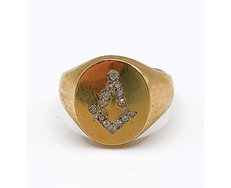 A yellow metal and diamond masonic ring, the compass design inset with small old-cut diamonds, shank unmarked (likely 9ct), s