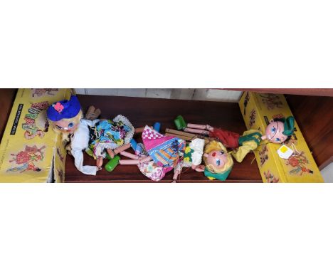 Pelham Puppets Tyrolean Boy and Girl in yellow lidded boxes and Mitzi puppet. 