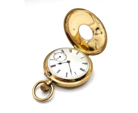 An 18ct yellow gold half hunter pocket watch, with blue enamel chapter ring, white enamel Roman numeral dial and second subsi