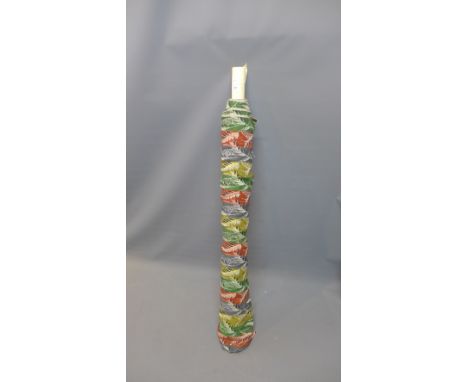 A roll of vintage retro 1970's fabric having colourful fern design 