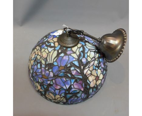 A Tiffany style light shade with stained lead glass floral design. 