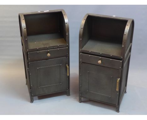 A pair of industrial side cabinets with shelf above draw and cupboard door, raised on peg feet. H-73cm, W-34cm, D-29cm 