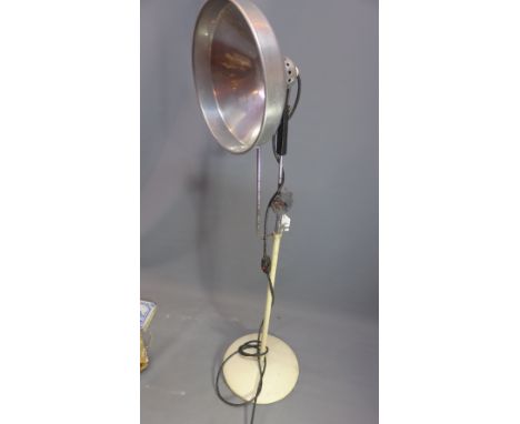 An early 20th Century pot light lamp with chrome shade