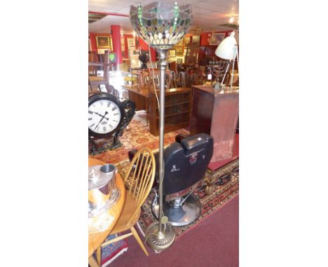 A Tiffany style standard lamp with stained lead glass shade decorated with dragon flies. 