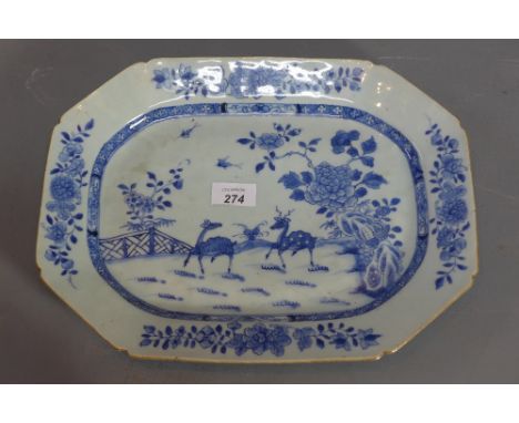 An 18th Century Chinese blue and white ceramic platter decorated with deer in a garden scene, 27cm x 36cm