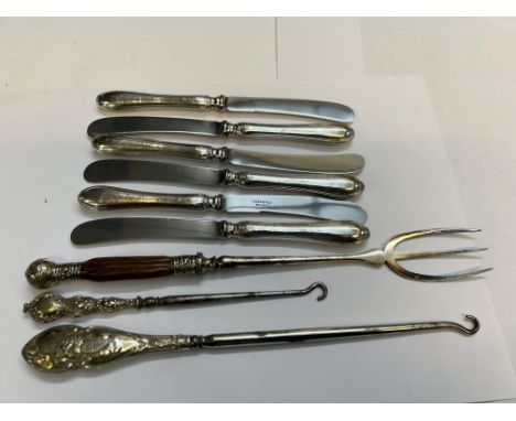 Silver toasting fork, x2 silver and gold button hooks and x6 silver handled butter knives
