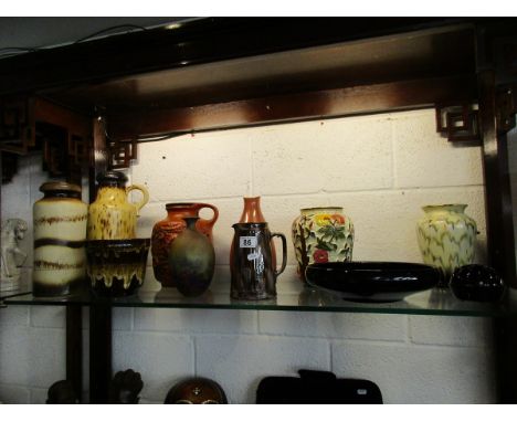 Shelf of Studio pottery