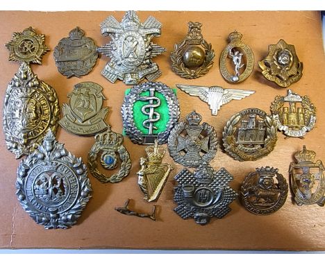British and other WWI and WWII Period Military Cap Badge lot (20) Mostly repaired or broken badges (Some Scarce) including: A