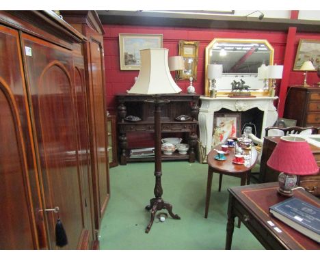 An acanthus leaf carved and turned column lamp standard with reeded stem and scroll feet with shade