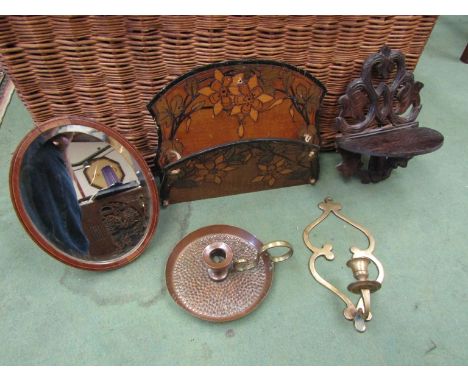 An oval easel back mirror, brass wall candle sconce, copper hammered chamber stick, treen wall pocket and oak shelf (5)