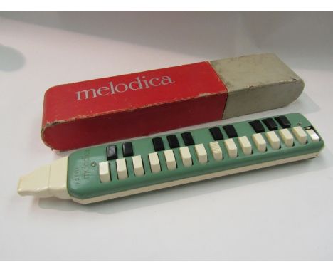 A Hohner Melodica and a Bandmaster harmonica (2)