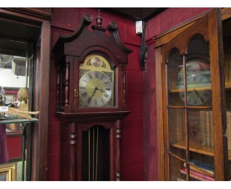 A mid 20th Century longcase clock, case in three sections, with pendulum and three weights