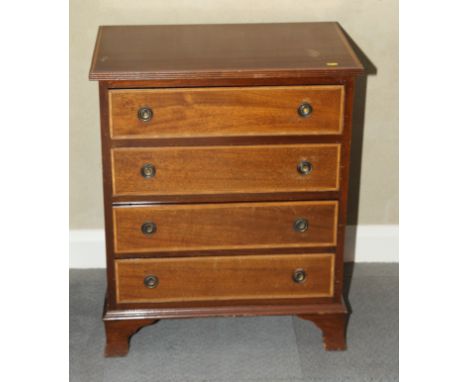 A Georgian design mahogany and satinwood banded chest of four drawers, on bracket supports, 25" wide