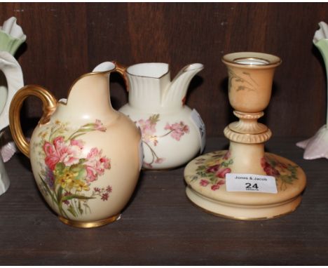 A Royal Worcester ivory blush candlestick decorated flowers, 4 1/2" high, and two similar jugs