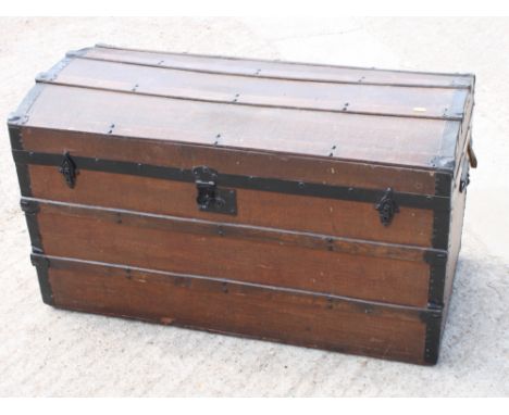 A slatted dome top cabin trunk, 40" wide