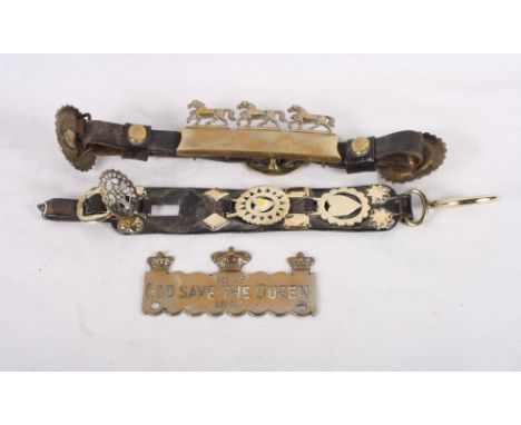 A leather brow band with two blue ceramic and brass bosses and a triple horse brass, a leather pony strap with three brasses 