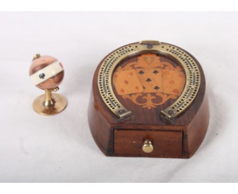 An inlaid rosewood and brass mounted horseshoe cribbage marker, fitted one drawer, and a novelty whist marker in the form of 