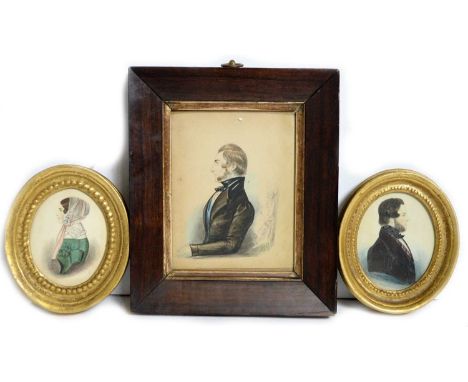 19th Century British SchoolA group of three portrait miniatures, comprising husband and wife pair c.1840, and a portrait of a