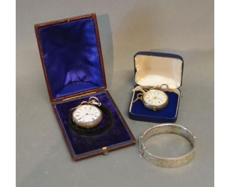 A 935 Silver Cased Fob Watch together with another similar silver cased pocket watch and a silver bangle 