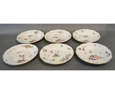 A Set of Six 19th Century Meissen Porcelain Dishes, each hand painted with summer flowers and highlighted with gilt and with 