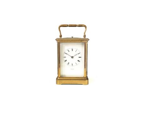 A good mid-late 19th century French bell-striking carriage clock, retailed by Hatton of Paris
The corniche case with oval ins