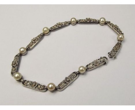 FRENCH BRACELET.
A French cultured pearl & old cut diamond bracelet. Length 20cm. (lacks clasp) CONDITION REPORTS: The metal 