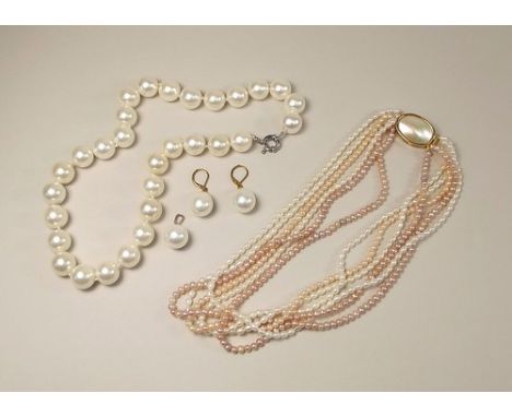 COSTUME JEWELLERY.
Two faux pearl necklaces, a pendant & drop earrings.