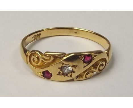 GOLD RING.
A Victorian 18ct. gold ruby & diamond set ring. Size P/Q. CONDITION REPORTS: The ring is stamped 18ct. but is not 