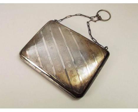 SILVER PURSE.
An engine turned silver purse/necessaire.
8 x 11cm.