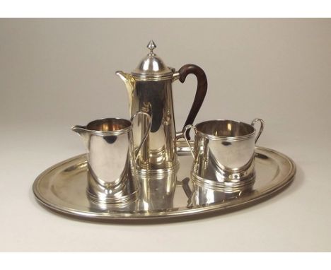 GUILD OF HANDICRAFTS.
A modern Guild of Handicrafts, four piece coffee service. Stamped with G of H mark & JAH for Julian Har