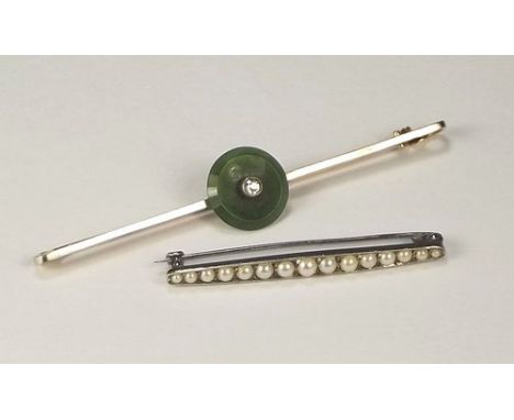 BAR BROOCHES.
A 9ct. white gold, pearl set bar brooch & a diamond set jade bar brooch.