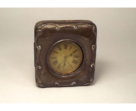 TRAVELLING CLOCK.
A silver mounted clock case with nickel plated Goliath travelling clock.