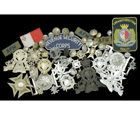 Malta Police Badges. A very good and scarce selection of Maltese Police Badges, Buttons, Buckles, Cloth Patches, etc. from th